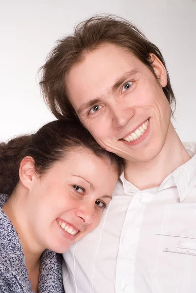 Young couple on white — Stock Photo, Image