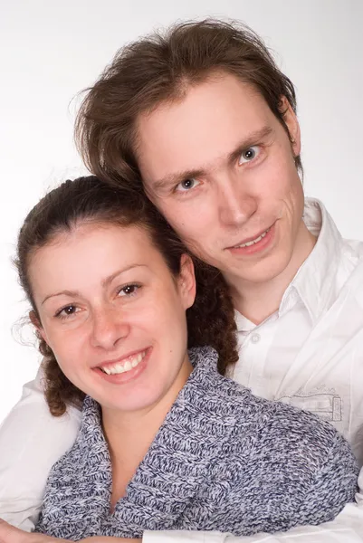 Молода пара на білому — стокове фото