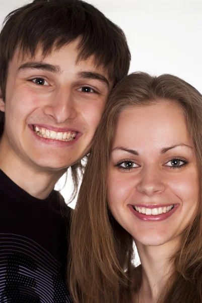 Jongen en meisje glimlachen — Stockfoto