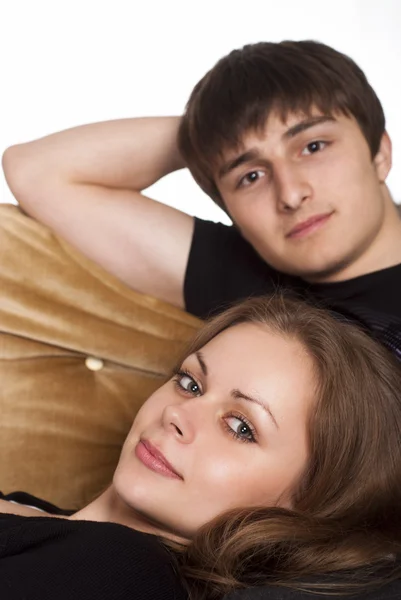Couple on sofa — Stock Photo, Image