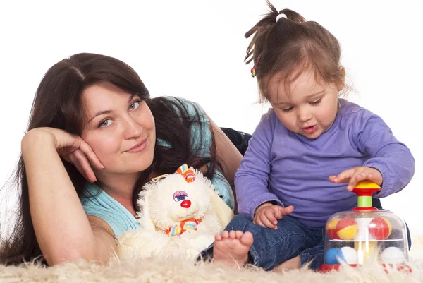 Happy mom plays with her child — Stock Photo, Image