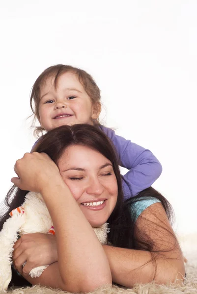 Happy mom plays with her child — Stock Photo, Image