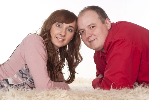 Nice couple on carpet — Stock Photo, Image