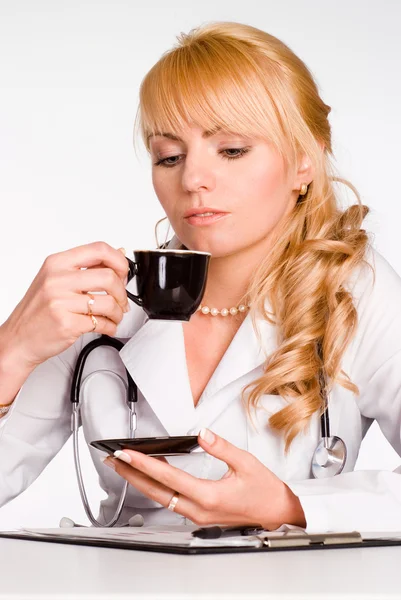 Doctor drinks tea — Stock Photo, Image