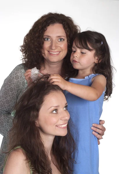 Tři dívky na bílém pozadí — Stock fotografie