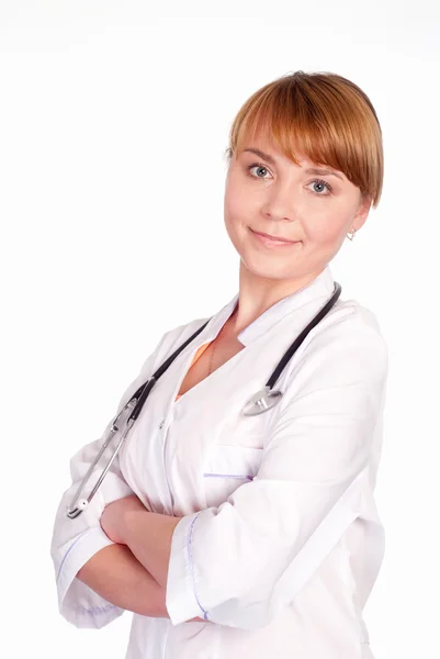 Uśmiechający się lekarz stoi — Zdjęcie stockowe