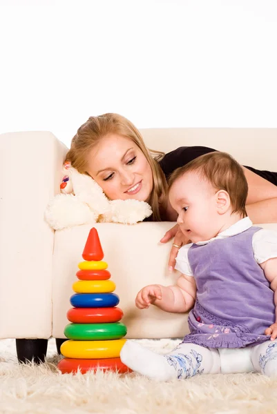 Little kid plays with mom — Stock Photo, Image