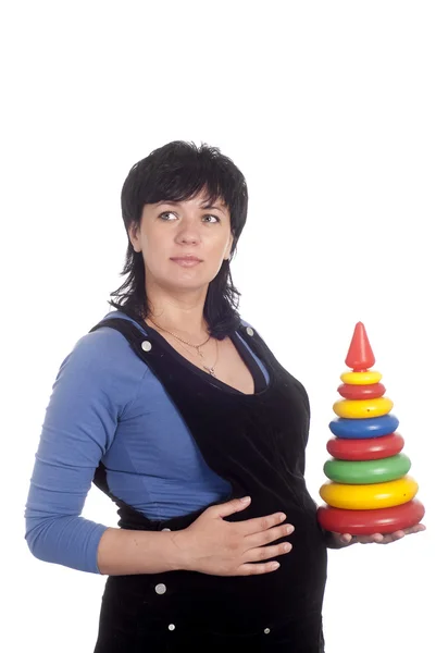 Mulher grávida com brinquedo — Fotografia de Stock