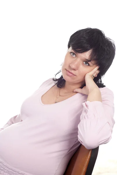 Zwangere vrouw zitten — Stockfoto