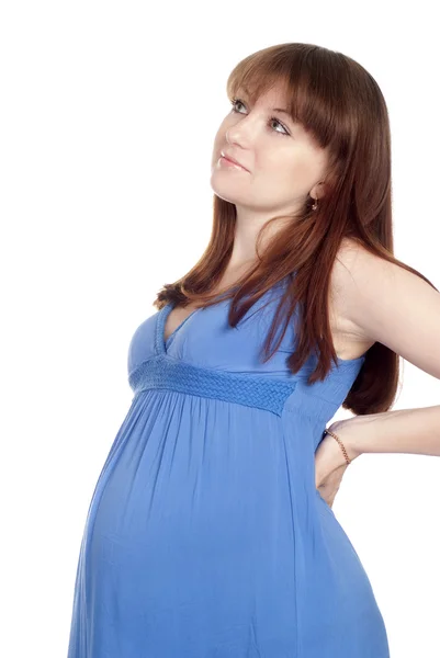 Беременная девушка в платье — стоковое фото