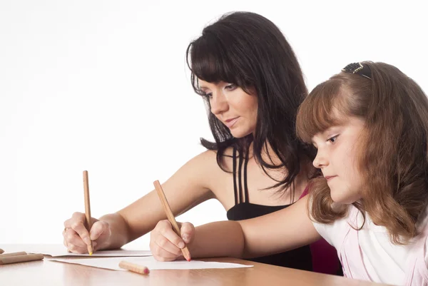 Mom and daughter drawing — Stockfoto