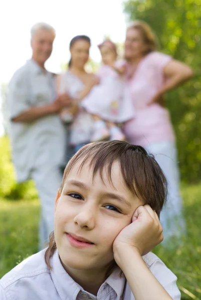 Boy with family — Stock Photo, Image