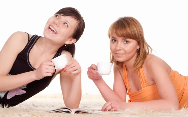Dvě dívky pít čaj — Stock fotografie