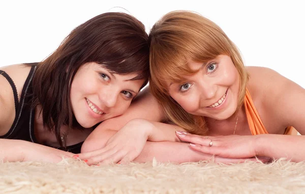 Юные девушки на ковре — стоковое фото