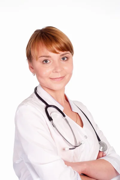 Uśmiechający się lekarz stoi — Zdjęcie stockowe