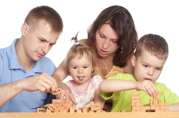 Family plays at table — Stock Photo, Image