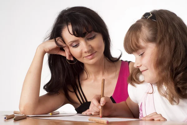 Mom and daughter drawing — Stock fotografie
