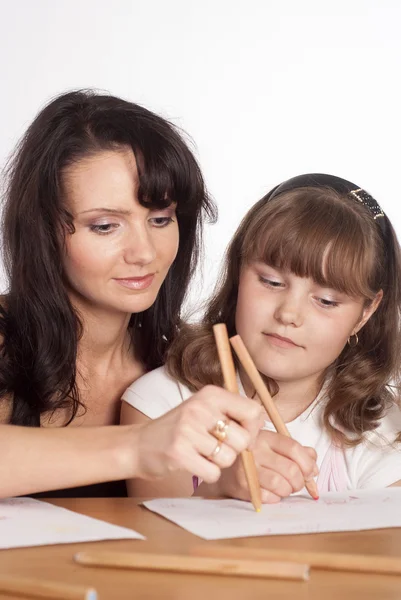 Mom and daughter drawing — Stockfoto