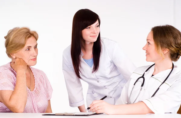 Doctors with patient — Stock Photo, Image