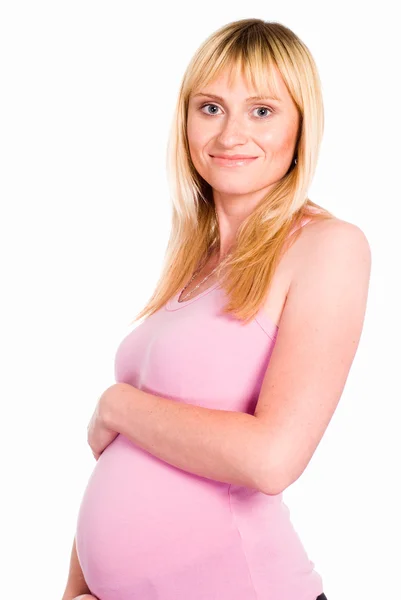 Беременная женщина стоит — стоковое фото