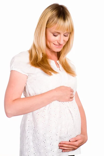 Donna incinta in bianco — Foto Stock