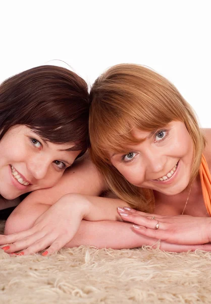Young girls on carpet — Stock Photo, Image