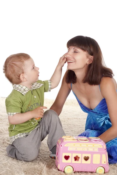 Mom and son on carpet — Stock Photo, Image