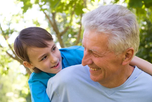 Grandson with his grandfather — Stock Photo, Image