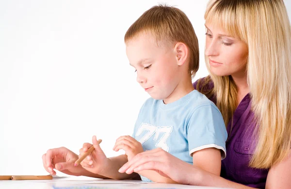 Son draws with mom — Stock Photo, Image