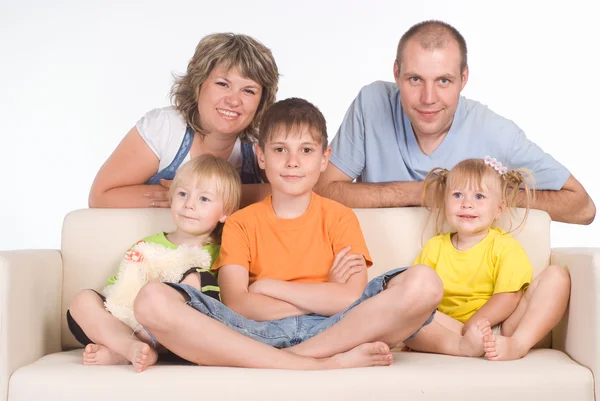 Family on sofa — Stock Photo, Image