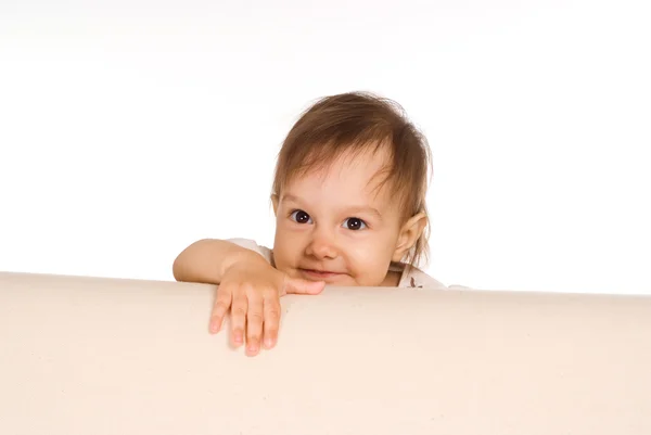 Baby på soffa — Stockfoto