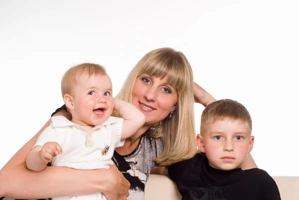 Счастливая мама с сыновьями — стоковое фото