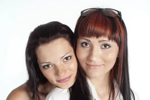 Twee meisjes op wit — Stockfoto