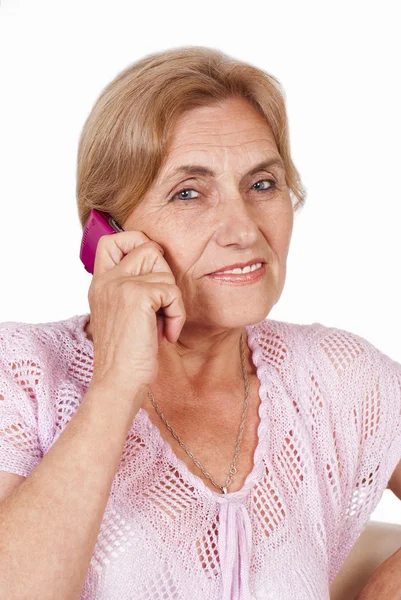 Starší žena s telefonem — Stock fotografie