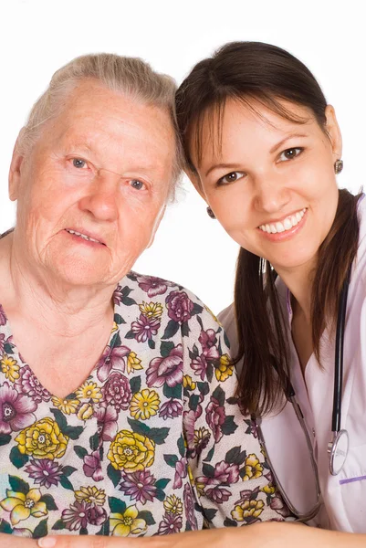 Krankenschwester und betagter Patient — Stockfoto