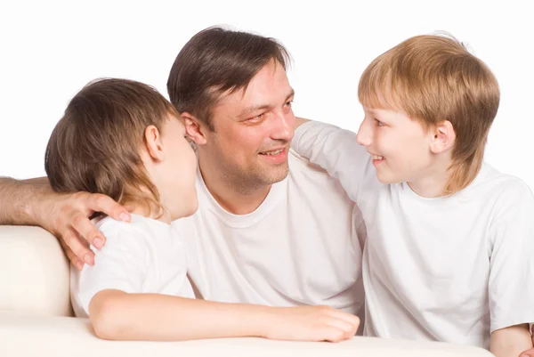Otec a synové na bílém pozadí — Stock fotografie