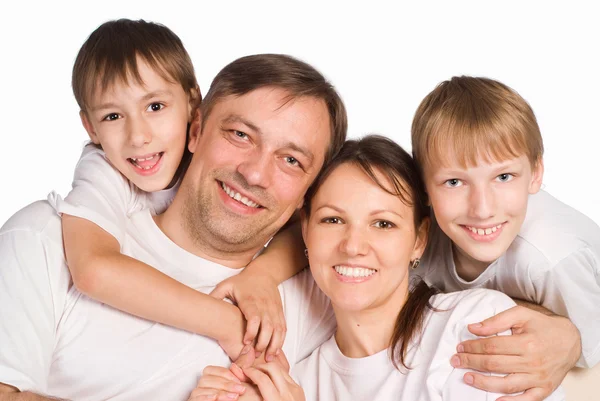Família feliz em um branco — Fotografia de Stock