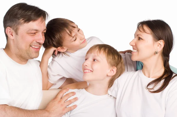 Šťastná rodina na bílé — Stock fotografie