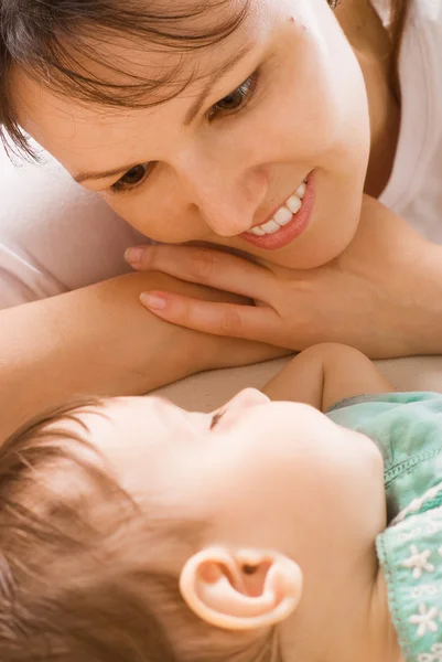 Mom with sleeping daughter — Stock Photo, Image