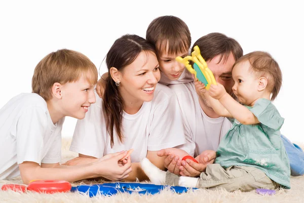 Family of a five on carpet — Stock Photo, Image