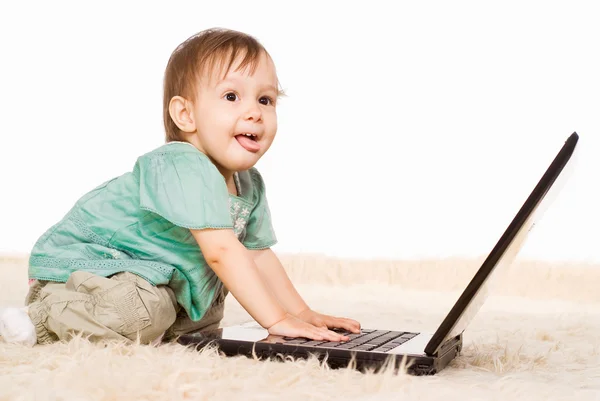 Little girl and laptop — Stock Photo, Image