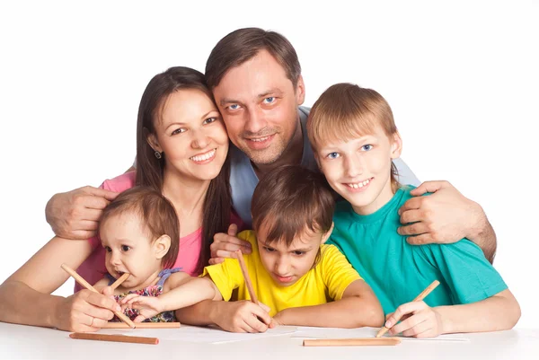 Rodina kreslení u stolu — Stock fotografie