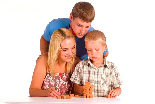 Familienspiel am Tisch — Stockfoto