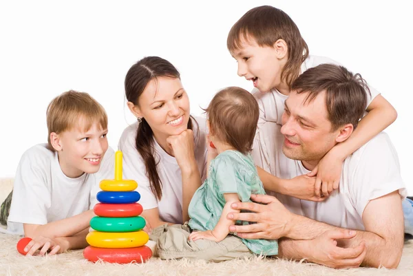 Rodziny z pięciu na dywanie — Zdjęcie stockowe