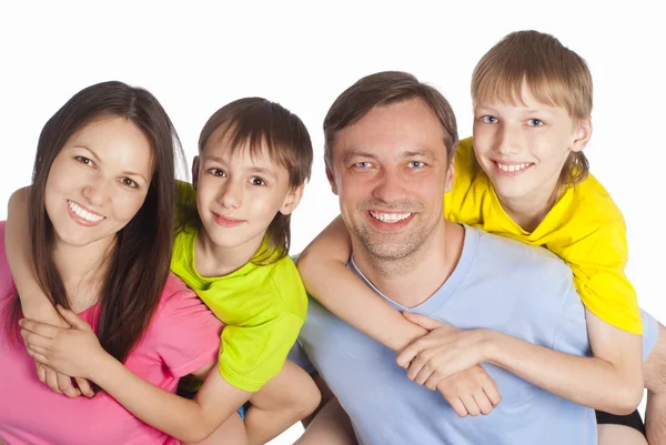 Família feliz em um branco — Fotografia de Stock