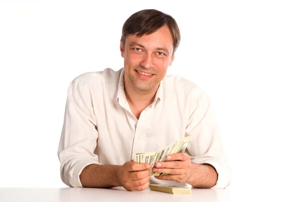 Άνθρωπος στο τραπέζι με μετρητά — Φωτογραφία Αρχείου