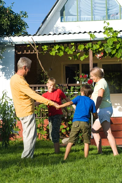 Grandsons with grandparents at nature — Stock Photo, Image