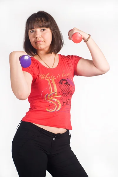 Girl with dumb bells — Stock Photo, Image