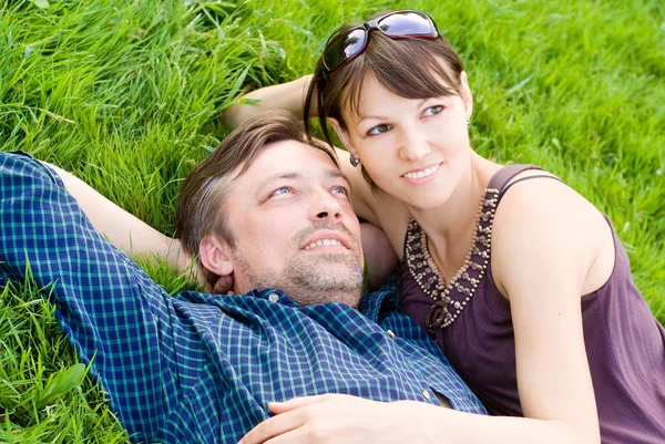 Cute couple on grass — Stock Photo, Image