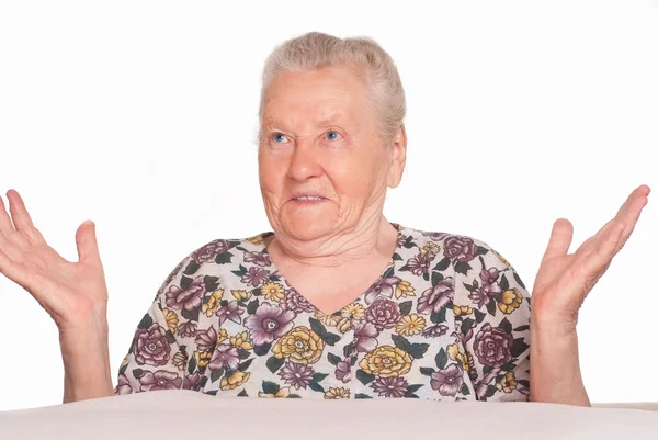Happy granny at table — Stock Photo, Image